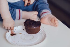 Baby eating cake