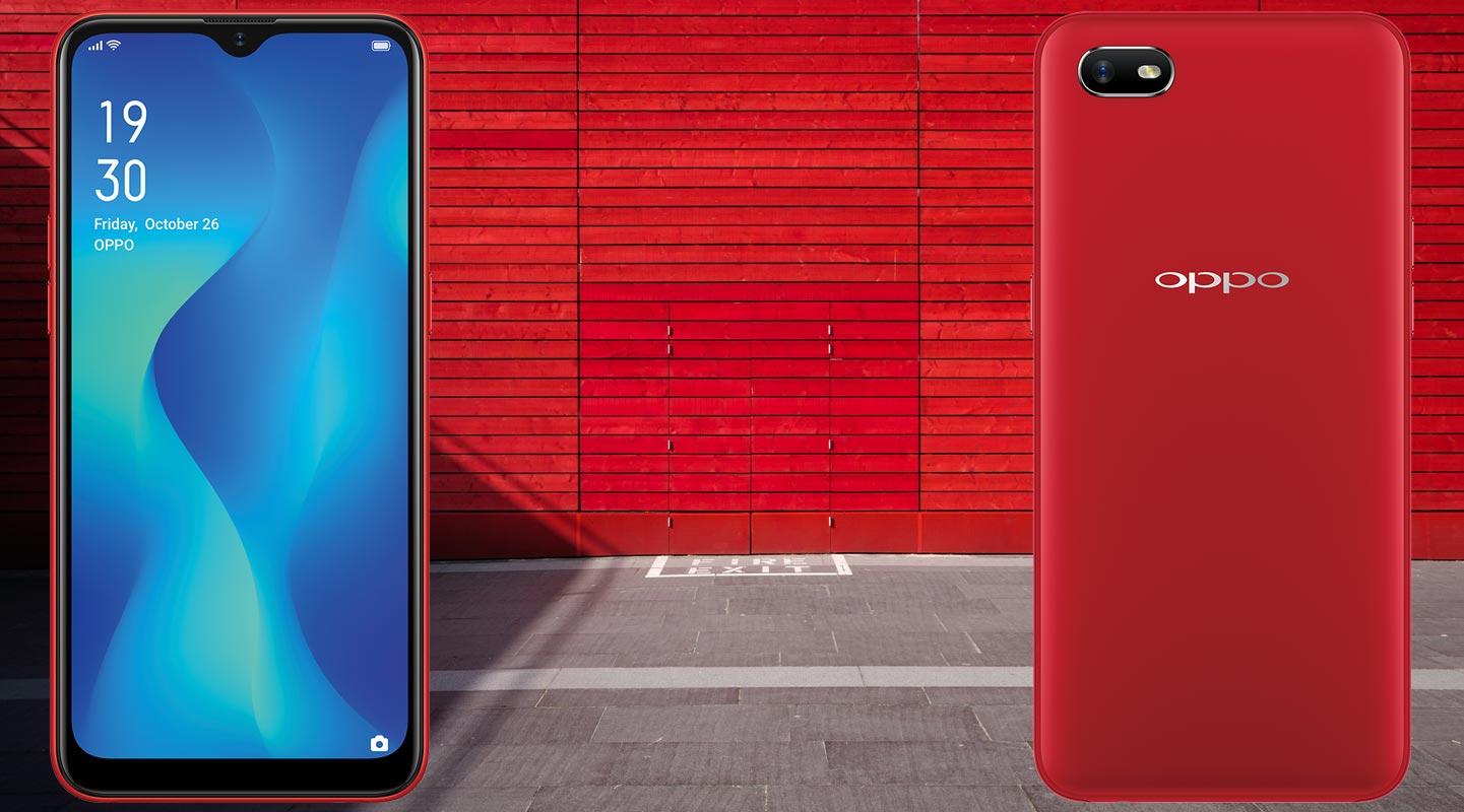Oppo A1k with Red Wall and Cement Floor Background
