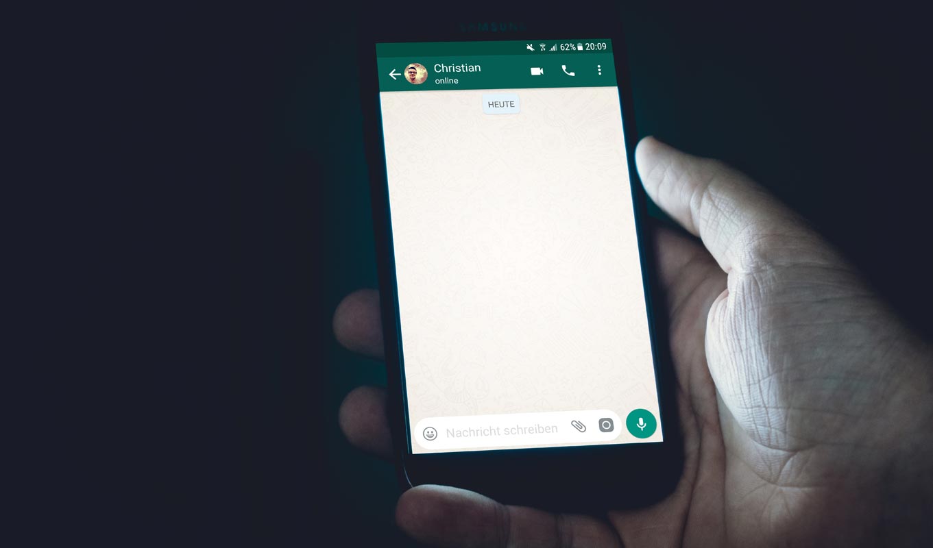 Whatsapp Chat on Mobile in Hand