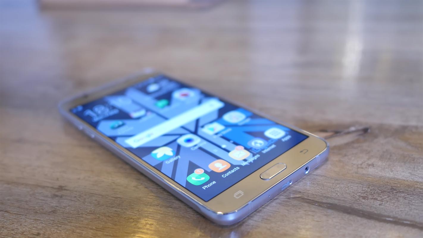 Samsung Galaxy J7 2016 on the Wooden Table
