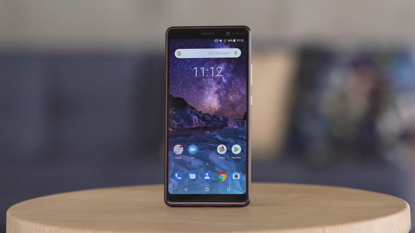 Nokia 7.1 Plus on the Wooden Table