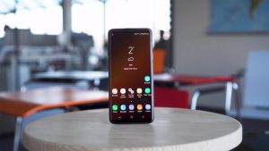 Samsung Galaxy S9 Plus on the Wooden table