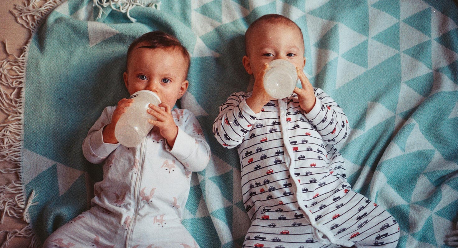 Two Babies Drinking Milk