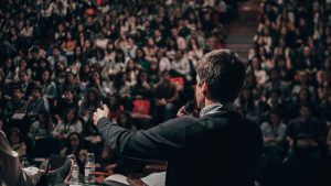 Man Giving Speech to Crowd