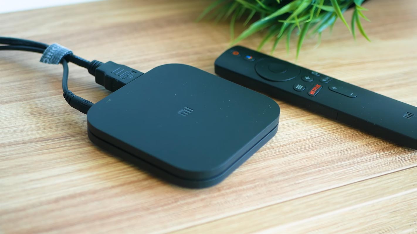 Mi TV Box on the Wooden Table With Remote