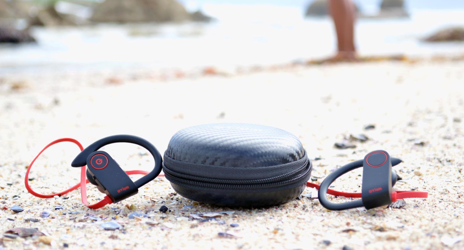 Bluetooth headphones on the beach