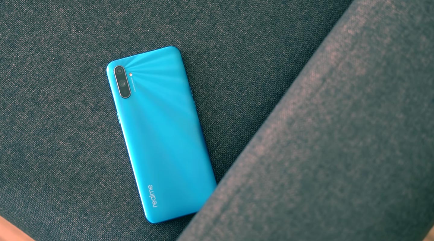 Realme C3 Back Side on the Sofa