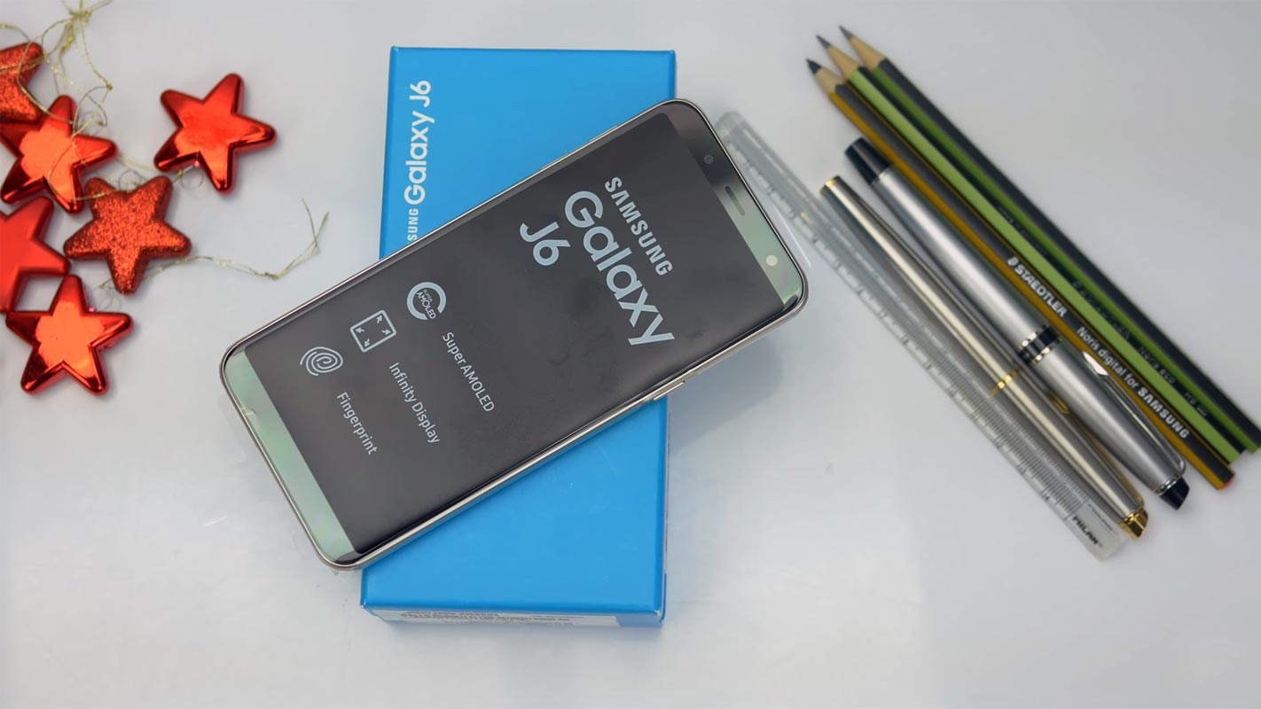 Samsung Galaxy J6 with Retail Box on the Table
