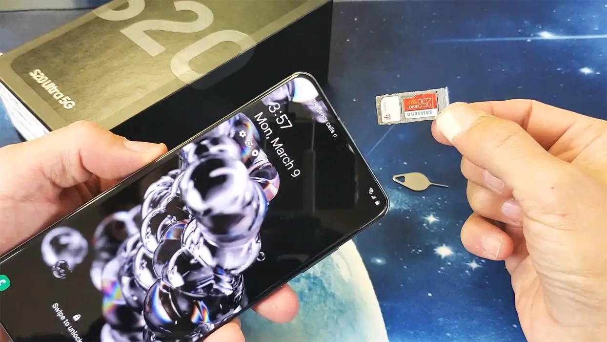 Samsung Galaxy Ultra 5G with SIM and Card tray in hand