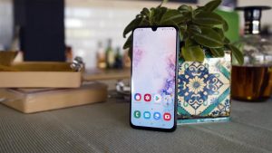 Samsung Galaxy A40 With Unlocked Home Screen on the Kitchen Table