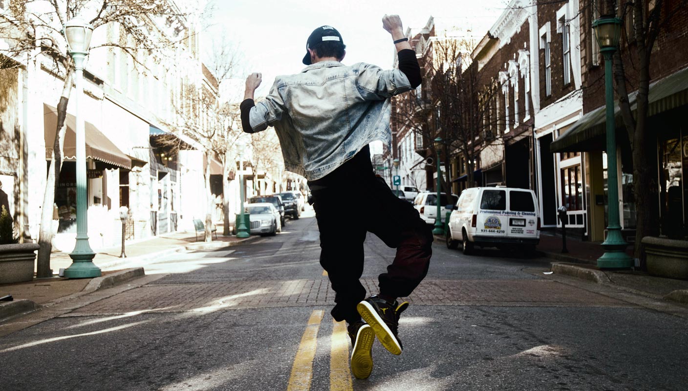 Person Dancing in Road