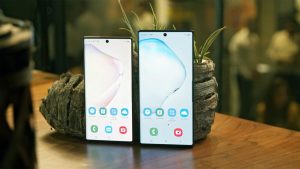 Samsung Galaxy Note 10 and Note 10 Plus near the small plant