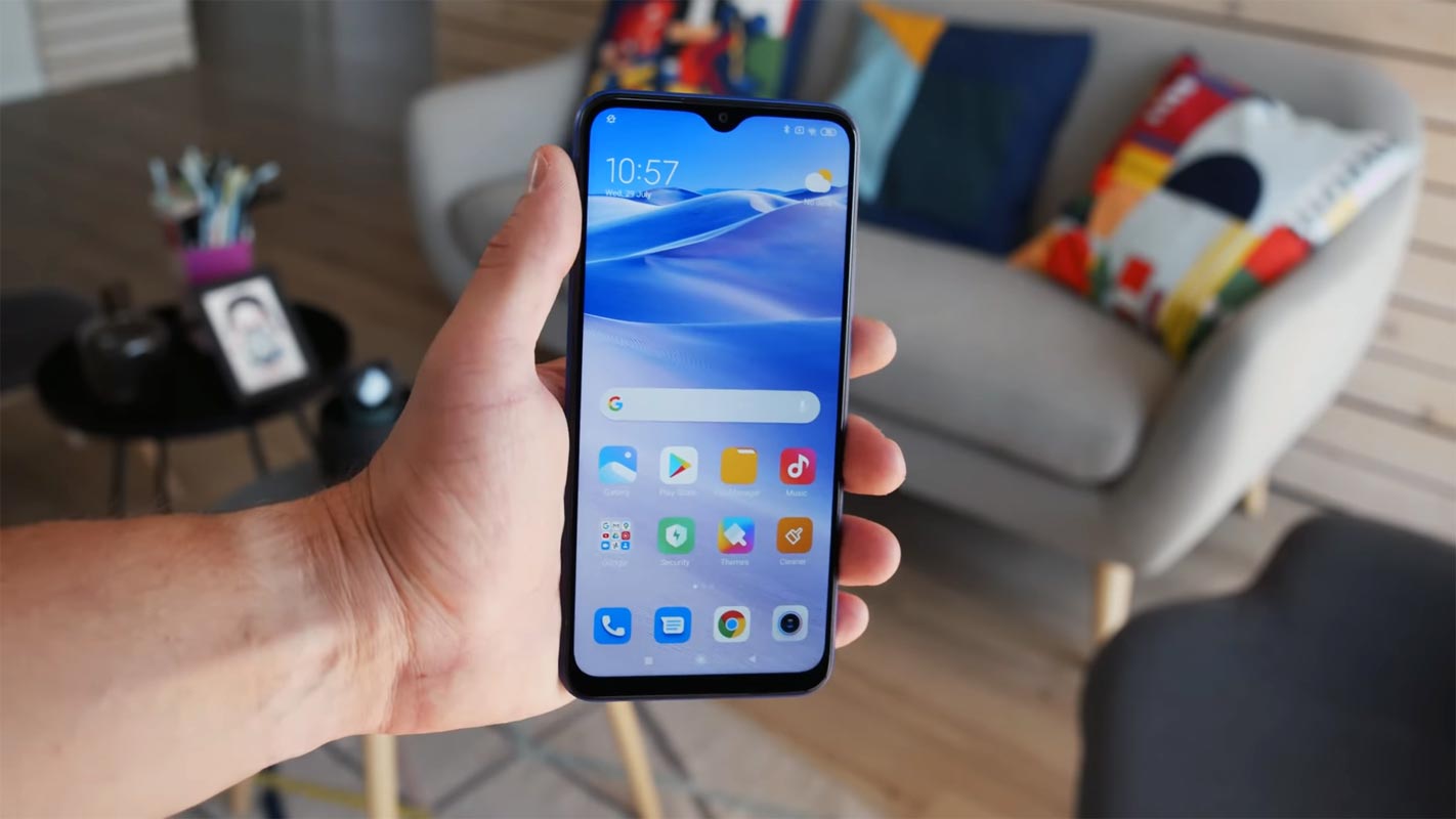 Redmi 9 Home screen in the hand