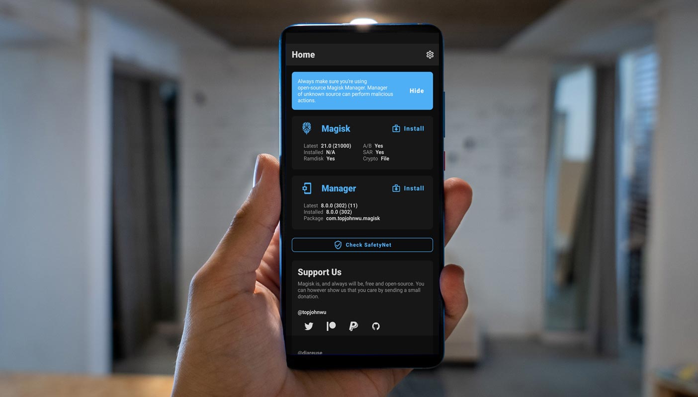 Magisk Manager 21 Zip and 8.0.0 APK File in a Mobile
