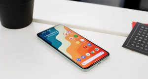 Google Pixel 5 Home screen on the table with icon sheet