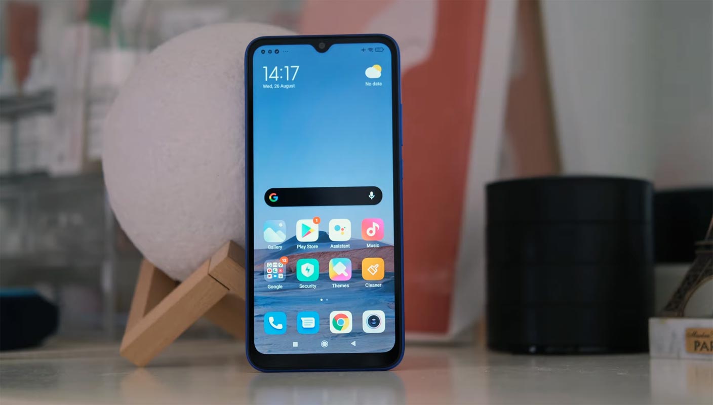 Xiaomi Redmi 9C NFC Home Screen on the Table