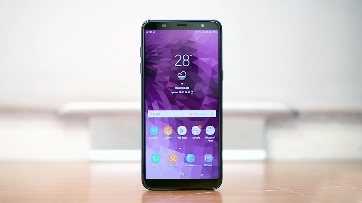 Samsung Galaxy J8 Home Screen on Table