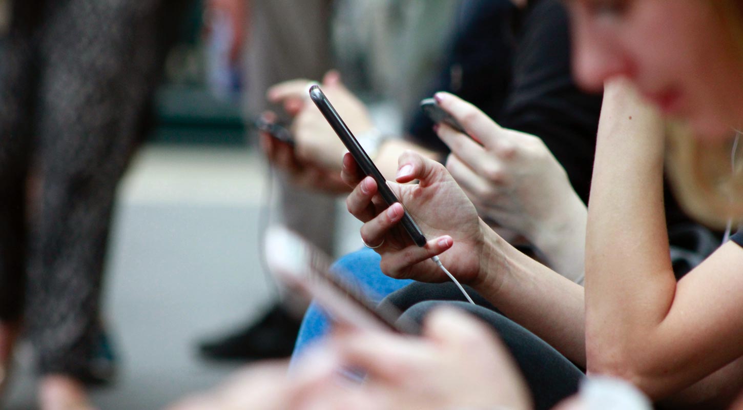 Woman Using Mobile with Charging