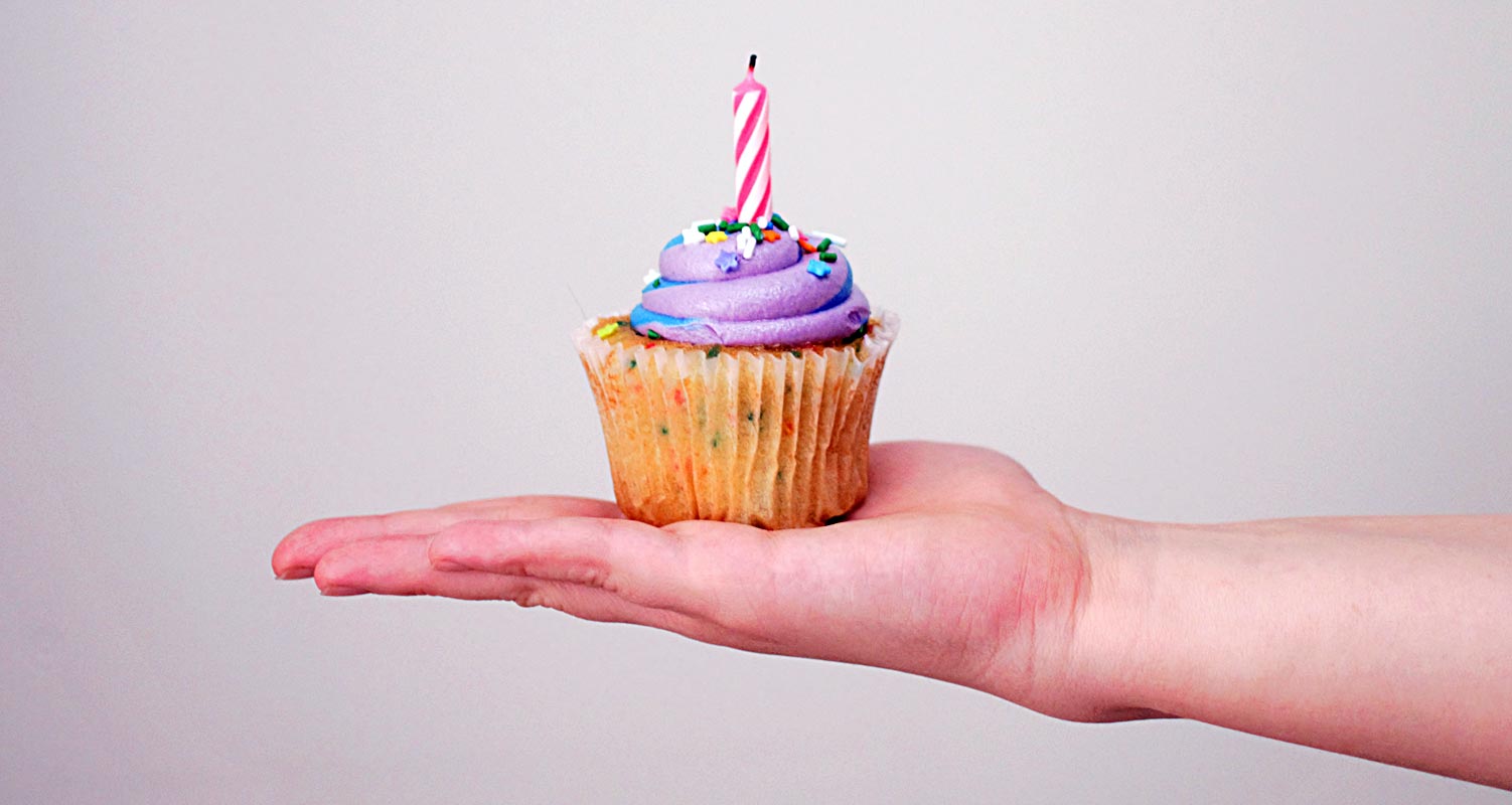 Birthday Cup Cake in Hand