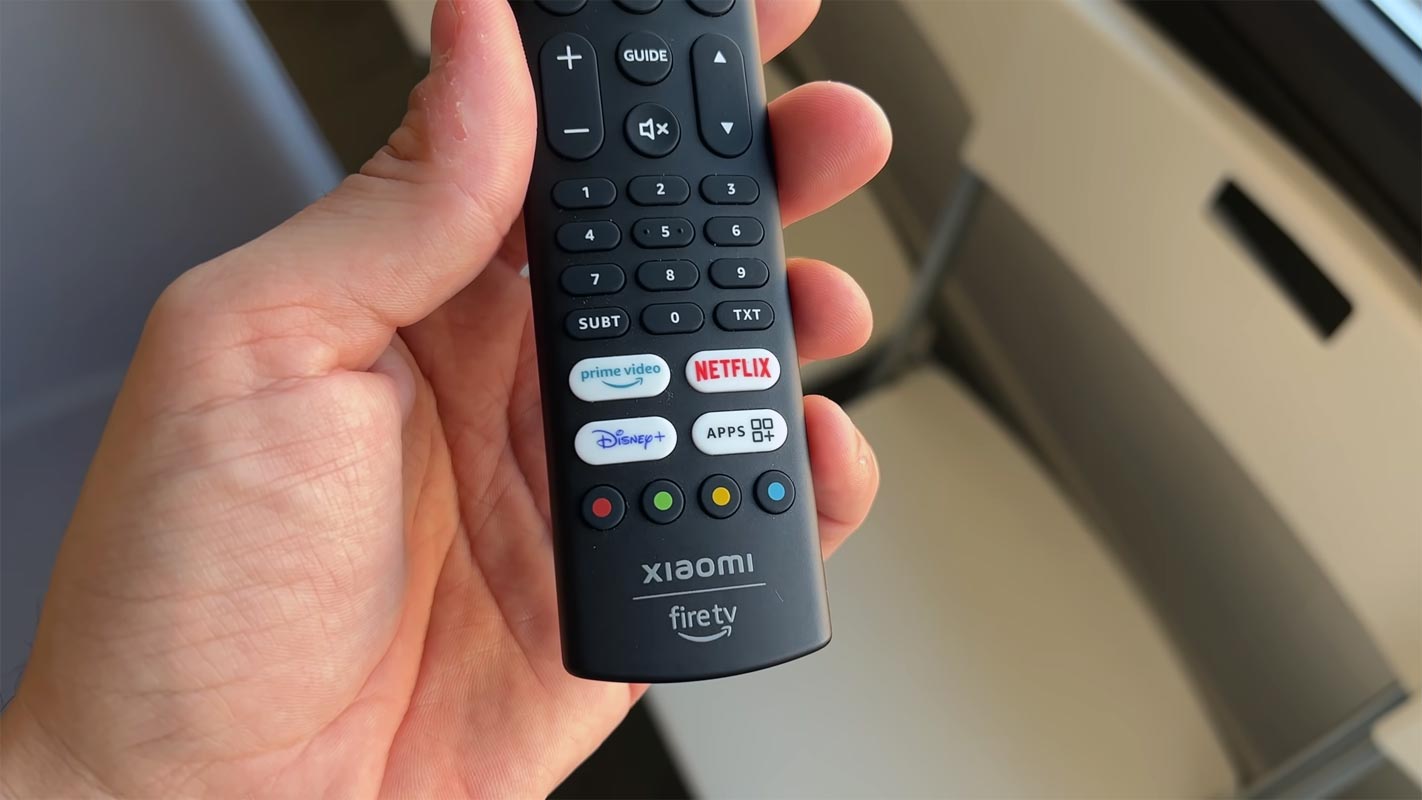 Xiaomi Amaozn Fire TV Remote in hand