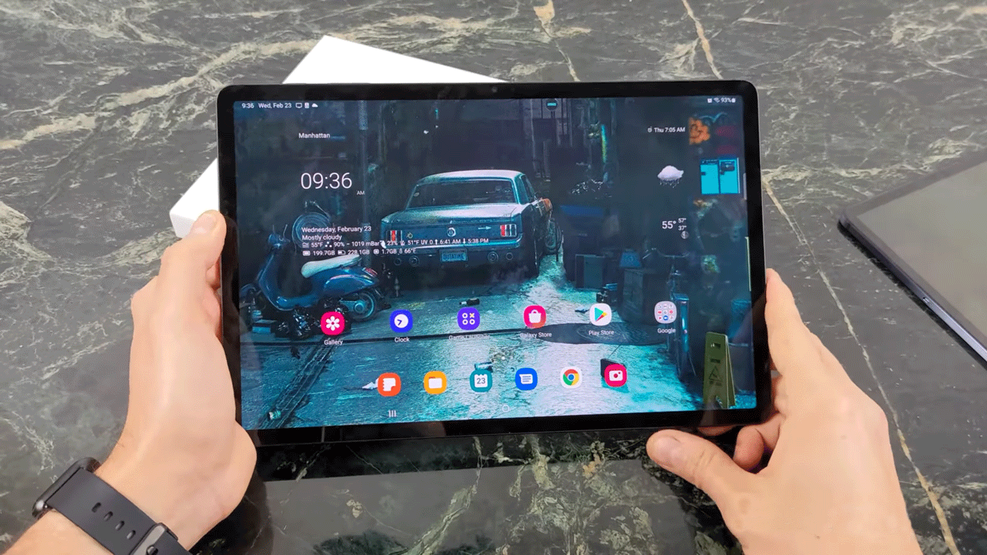 samsung galaxy tab s8 plus home screen in double hand