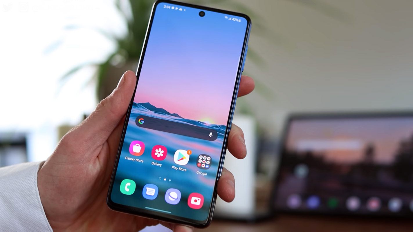 samsung galaxy f62 home screen in hand