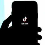 TikTok App Open Page in Mobile on hand