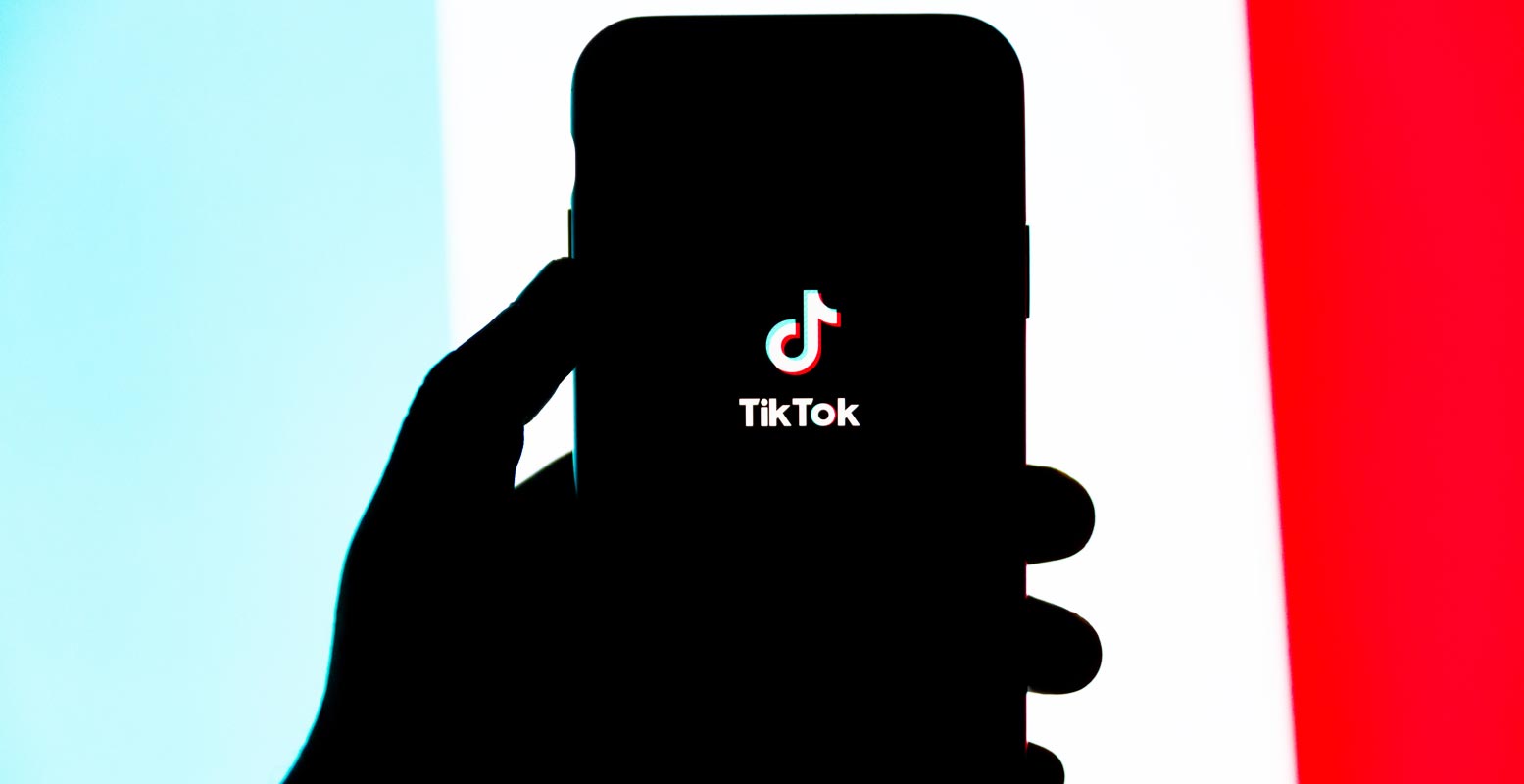 TikTok App Open Page in Mobile on hand