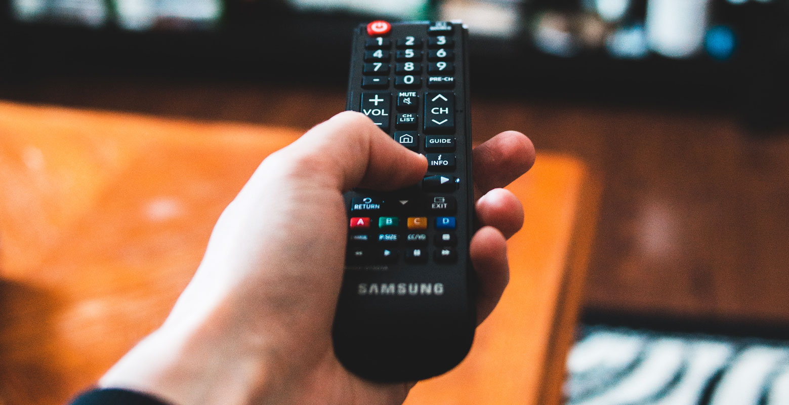 TV Remote in Hand