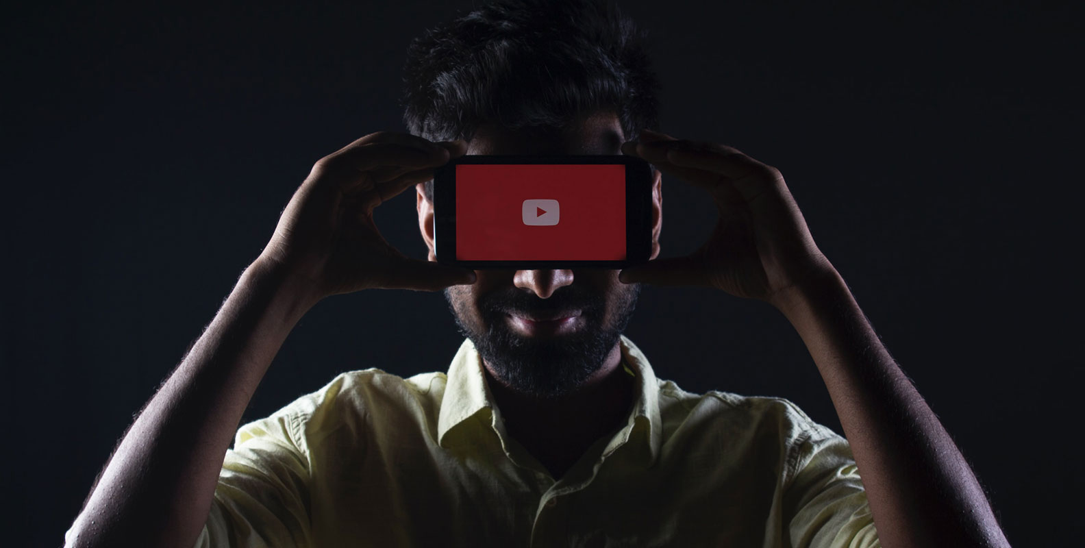 YouTube Logo Showing in Mobile with Eyes Hidden